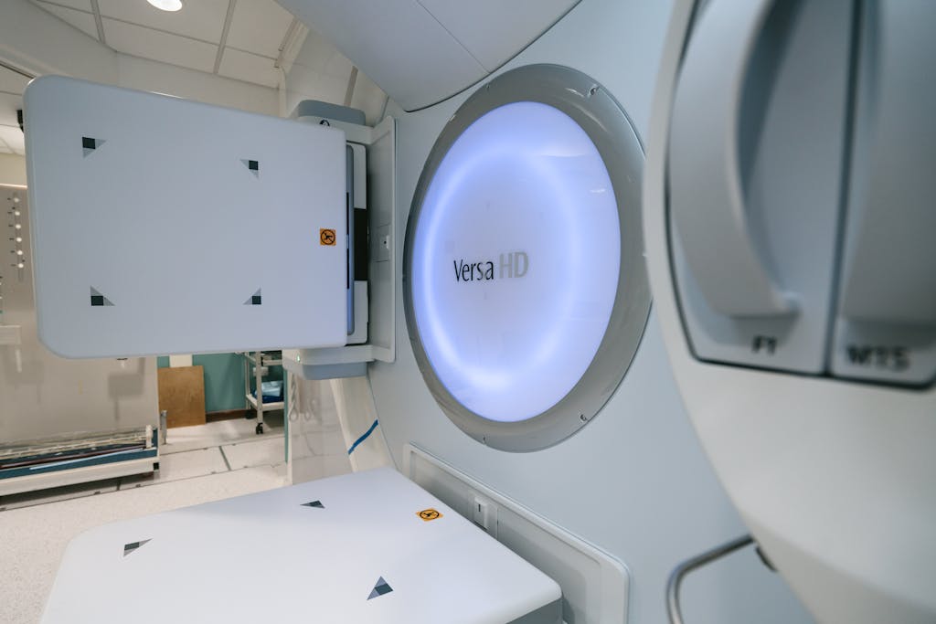 Close-up of Versa HD radiotherapy machine in a clinical setting.